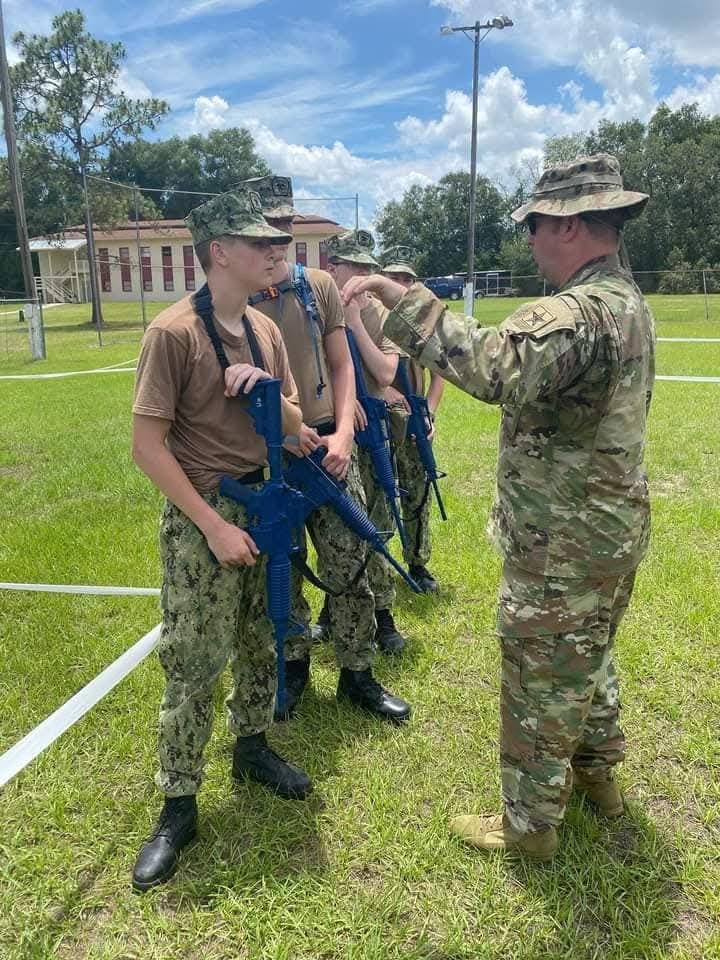 Ethan Harper in field operations training in Florida with rifle