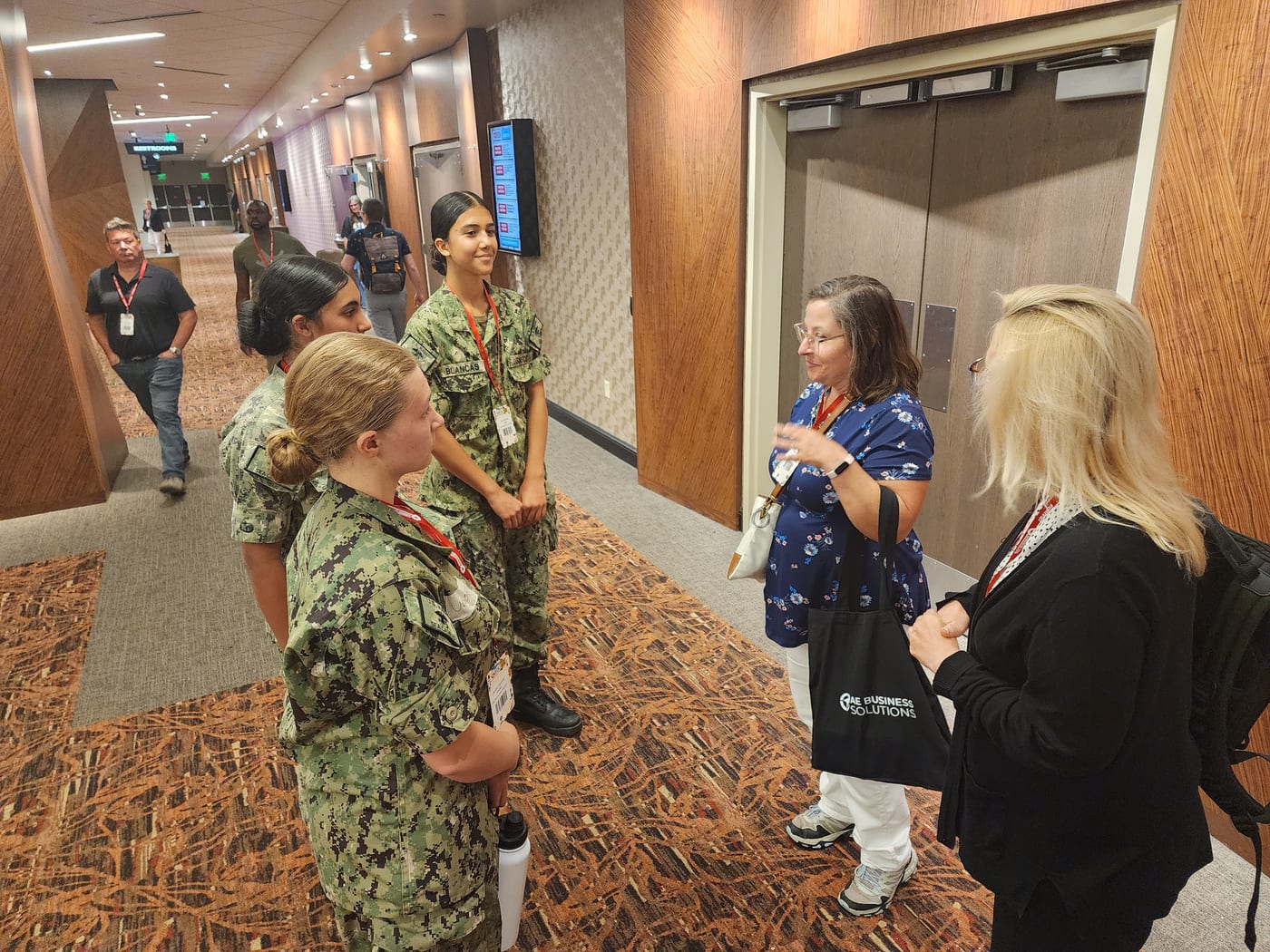 Kendra Ugoretz meeting with civilian professionals during cybersecurity training